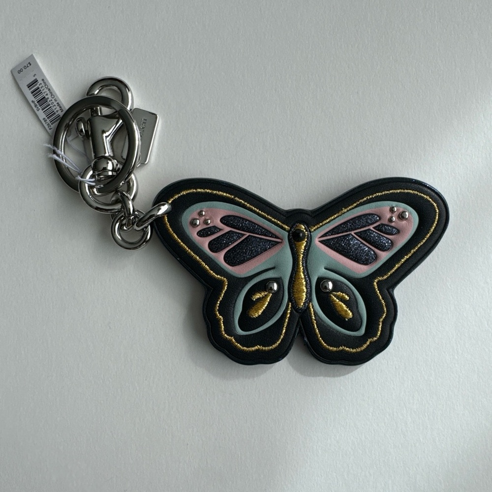 Coach blue butterfly bag charm